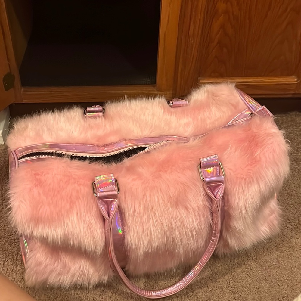 Pink fur duffle bag